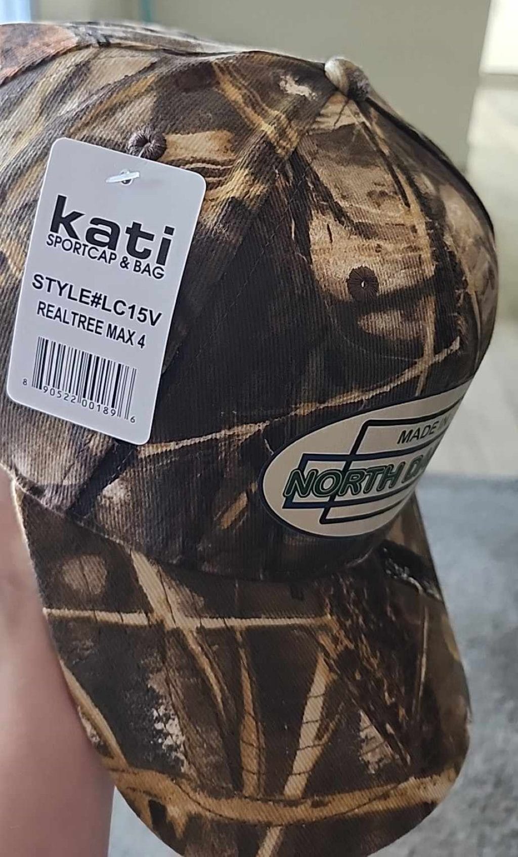 Oval Version of Made in North Dakota on a Camouflage Cap - Image 24