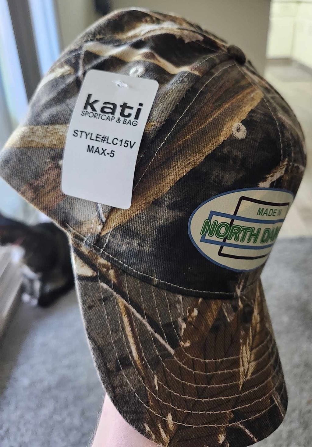 Oval Version of Made in North Dakota on a Camouflage Cap - Image 22