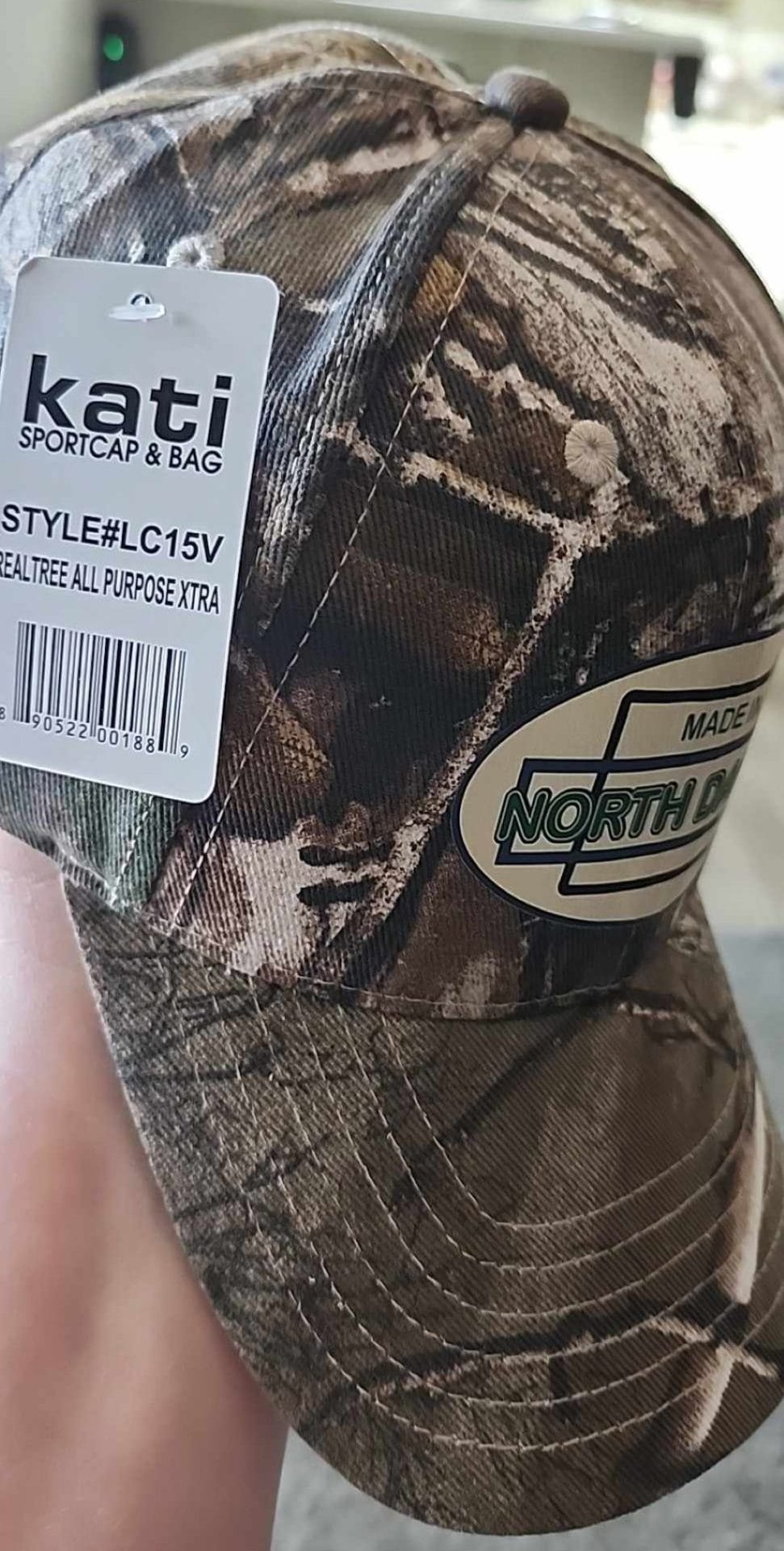Oval Version of Made in North Dakota on a Camouflage Cap - Image 3