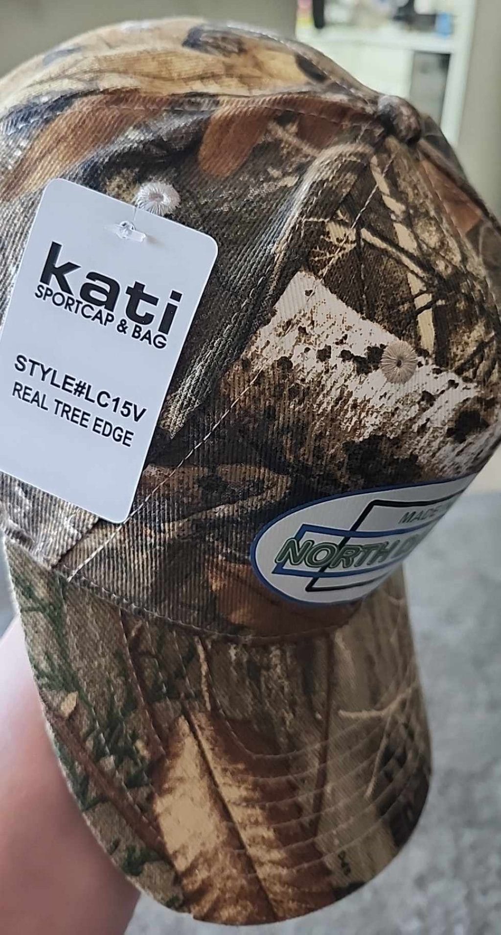 Oval Version of Made in North Dakota on a Camouflage Cap - Image 10