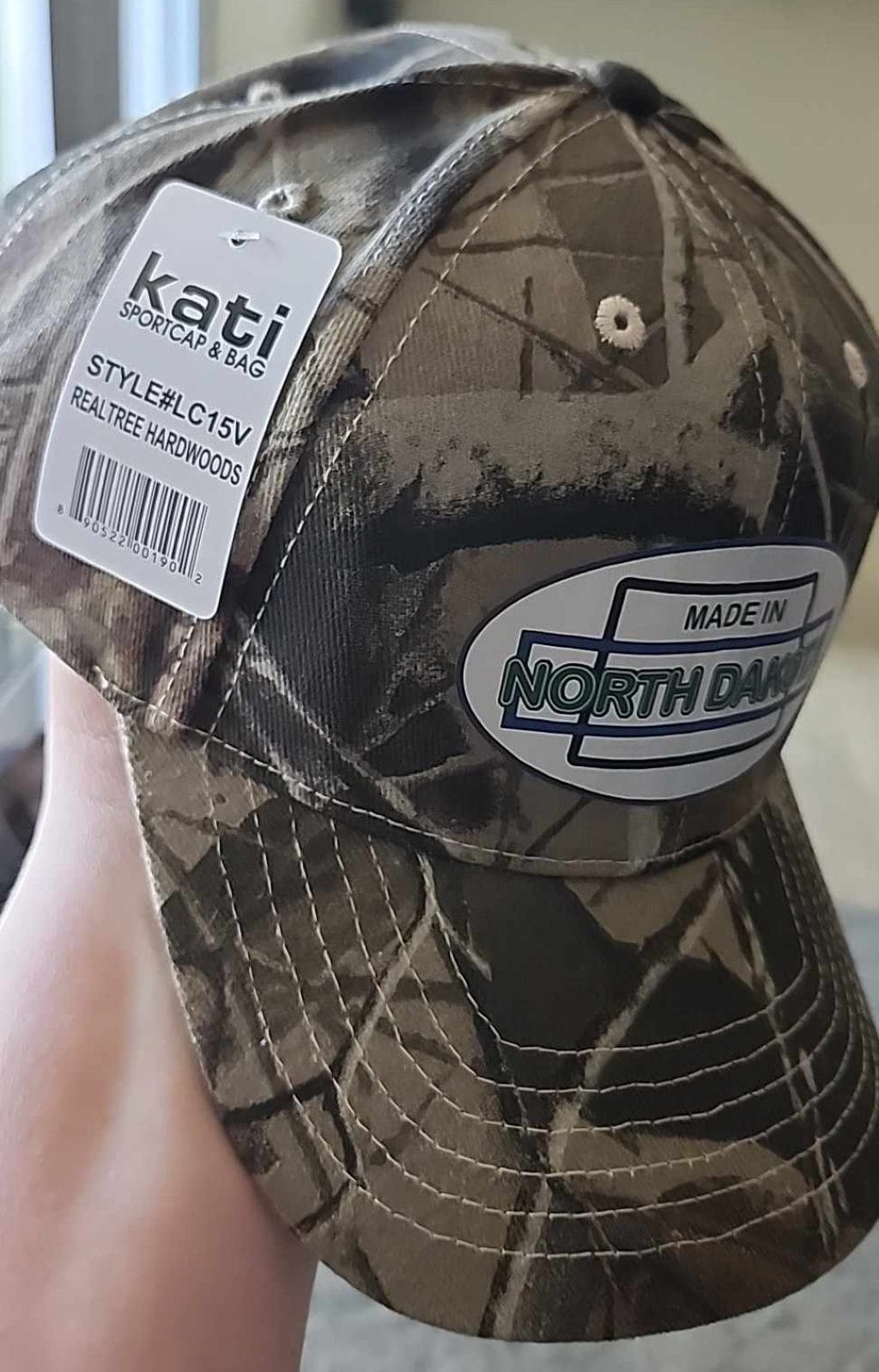 Oval Version of Made in North Dakota on a Camouflage Cap - Image 6