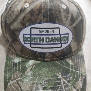 Oval Version of Made in North Dakota on a Camouflage Cap